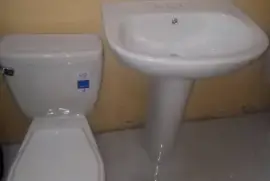 Brand New Toilet and Pedestal Face Basin