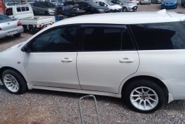 2 NISSAN AD WAGONS