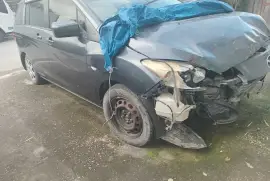 2010 mazda premacy damaged