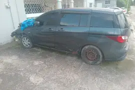 2010 mazda premacy damaged