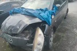 2010 mazda premacy damaged