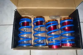 Adjustable coilover sleeves