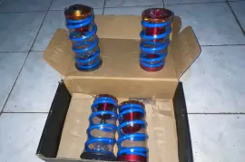 Adjustable coilover sleeves