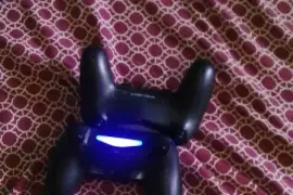 PlayStation 4 With 2 controllers and 10 games 