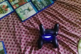 PlayStation 4 With 2 controllers and 10 games 