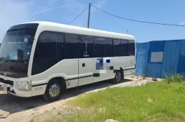 Toyota Coaster Deportee 2019