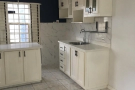 Spacious, unfurnished ground floor apartment